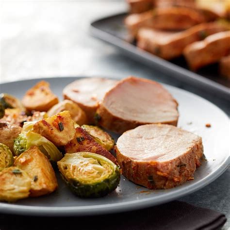 In another small bowl, combine salt and pepper. . Oven roasted pork tenderloin with potatoes and brussel sprouts